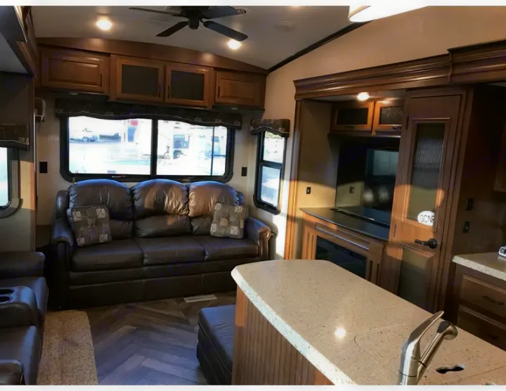 Couch in living room that pulls out into a queen bed. Jayco North Point 2016