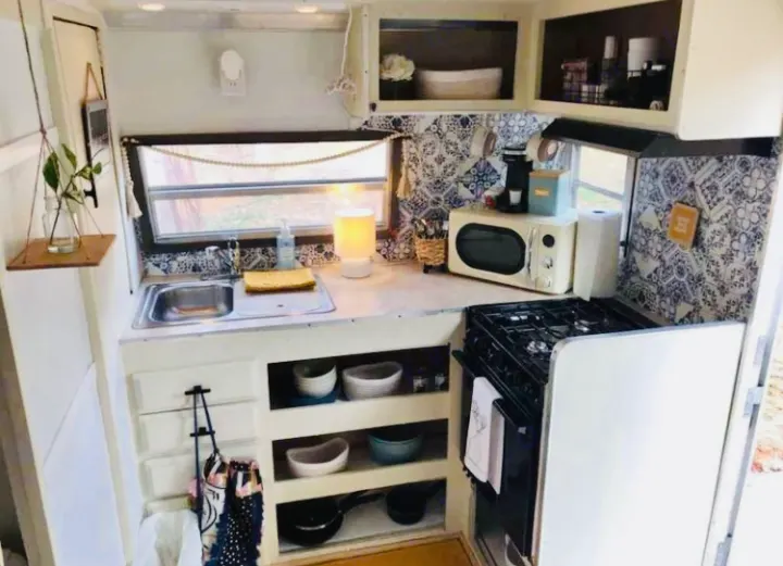 The kitchen area is stocked with everything you need to make a meal on your next getaway!. Shasta Other 1970