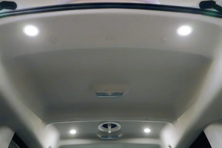 Overhead view of an RV rental interior, showcasing integrated LED ceiling lights and a central ventilation fan.. Ford Transit Connect Wagon 2022
