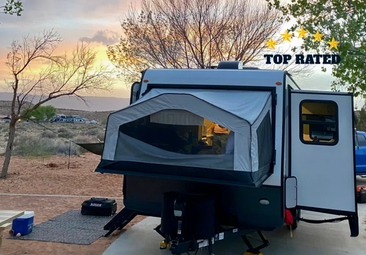Enjoying a beautiful sunset at our RV rental campsite. This top-rated pop-out RV offers comfortable outdoor living.. Forest River Rockwood Roo 2021