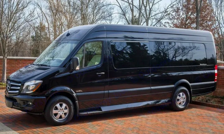 Luxury black Mercedes-Benz Sprinter van parked on a brick driveway, perfect for premium RV rental services.. Ultimate Toys Ultimate Limo 2022