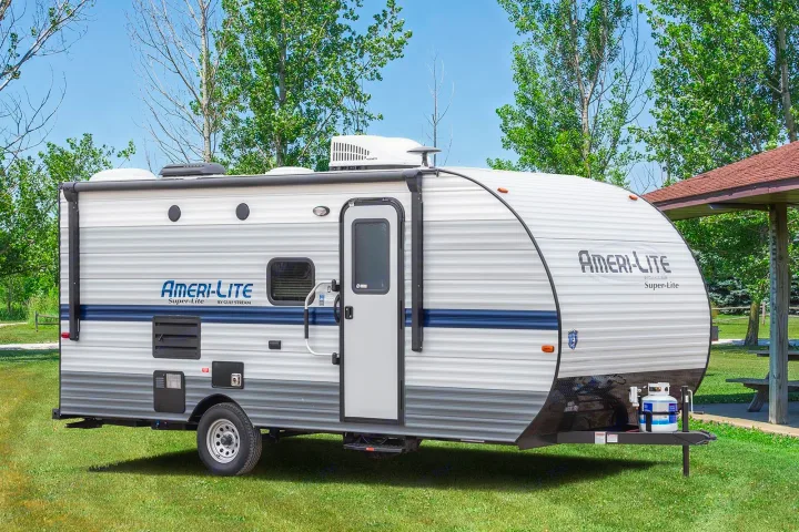 Ameri-Lite Super-Lite RV rental, a travel trailer parked on green grass. Perfect for outdoor camping trips.. Gulf Stream Ameri-Lite Super Lite 2022