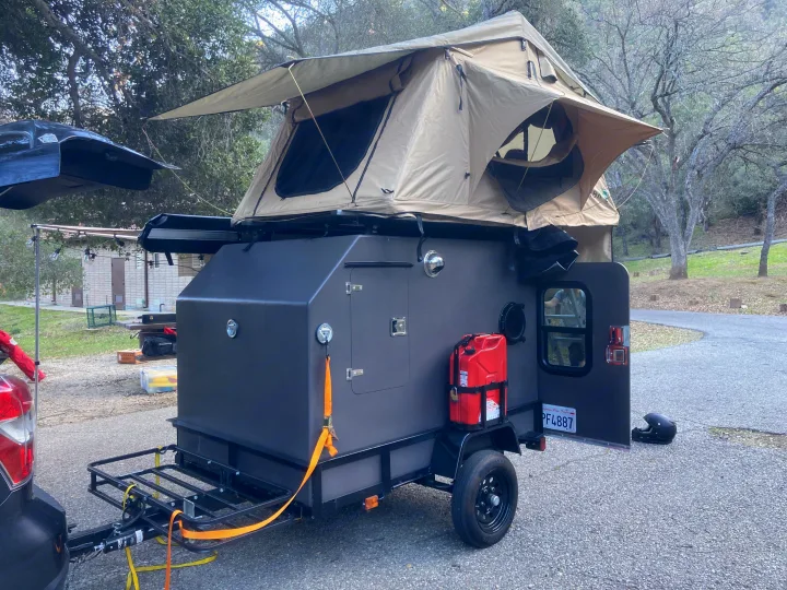 Additions since this photo: solar panel, upgraded tires, privacy room, fold down exterior shelf, stabilizer jacks. Custom Teardrop 2020