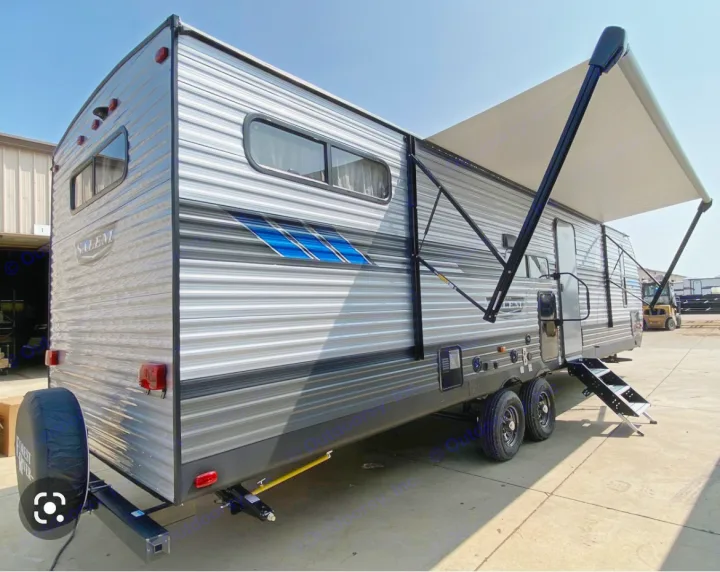Modern grey Salem travel trailer, awning extended, steps deployed. Great for an rv rental, ready for adventure.. Forest River Salem 2021