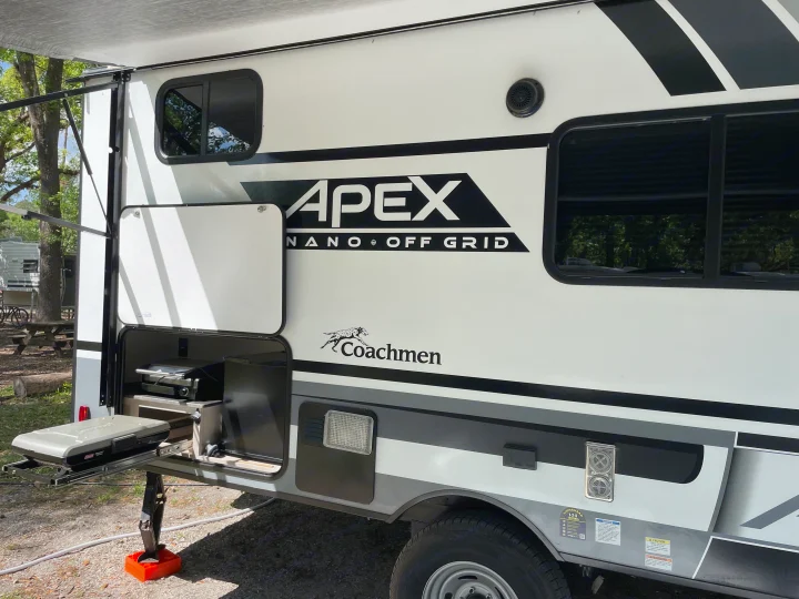 This Coachmen Apex Nano RV rental offers camping comfort with a pull-out outdoor kitchen and grill for scenic meals.. Coachmen Apex Nano 2022