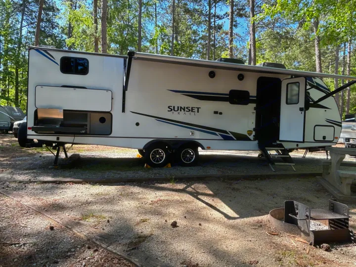 Large motorized awning with led might lights and outdoor speakers. . Crossroads RV Sunset Trail Super Lite 2021