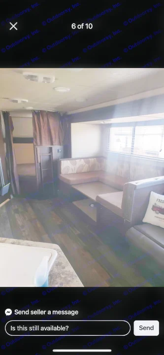 RV rental interior with dinette seating, bunk beds, and partial kitchen view, providing comfort for your travels.. Forest River Forrest River Cherokee Patriot Edition 26DBH 2015