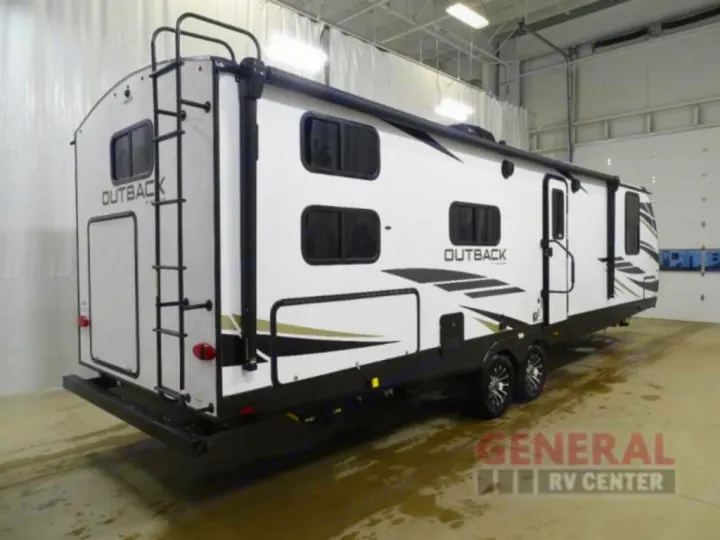 This spacious Outback travel trailer, ideal for your next RV rental adventure, features a rear ladder and awning.. Keystone RV Outback Ultra-Lite 2021