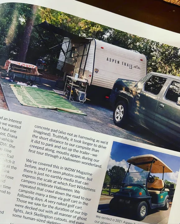An Aspen Trail RV rental and truck at a campsite, with text about Fort Wilderness Halloween camping & golf carts.. Aspen Other 2021