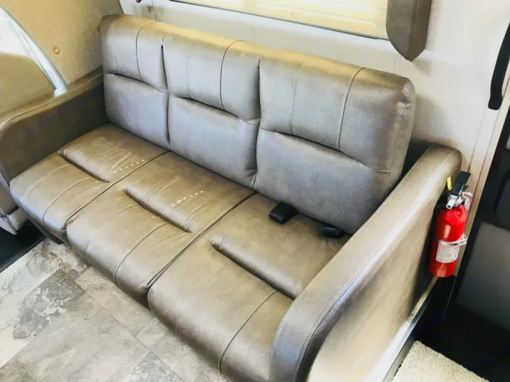 Enjoy your RV rental! This RV features comfortable seating with seatbelts & a fire extinguisher for safe travels.. Coachmen Leprechaun 2016