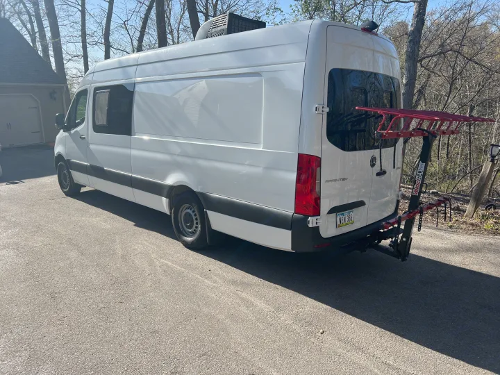 White Mercedes-Benz Sprinter camper van with bike rack, ready for adventure. Ideal for an RV rental getaway.. Mercedes-Benz Sprinter RV Motorhome Campervan 2022