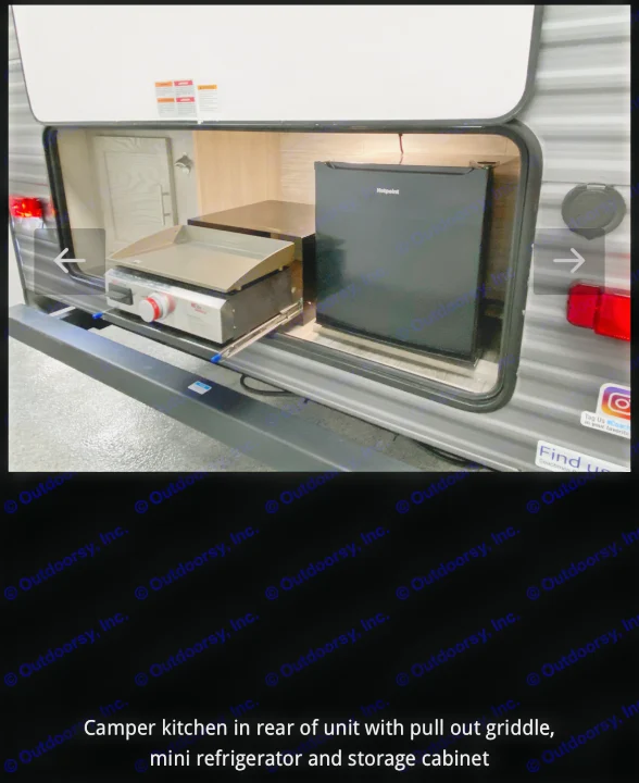 RV rental: Exterior camper kitchen with pull-out griddle, mini-fridge, and storage.. Coachmen Summit series 2023