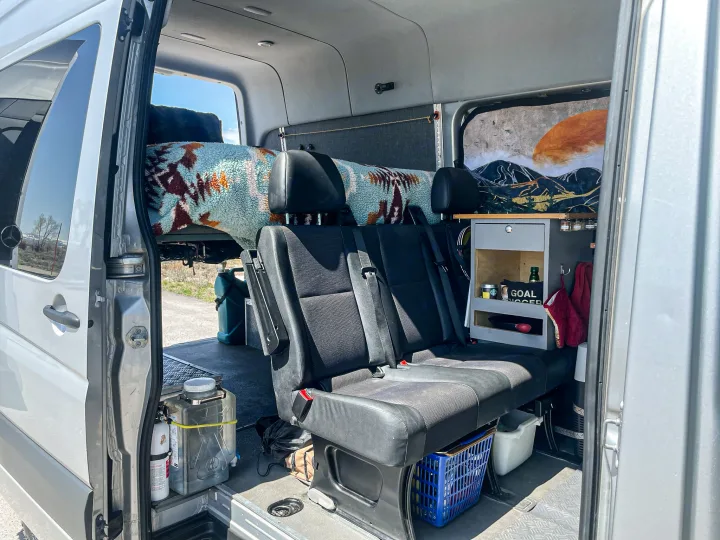 Experience van life! This RV rental offers comfortable seating, a cozy bed, and essential storage for travels.. Mercedes-Benz Sprinter 2016