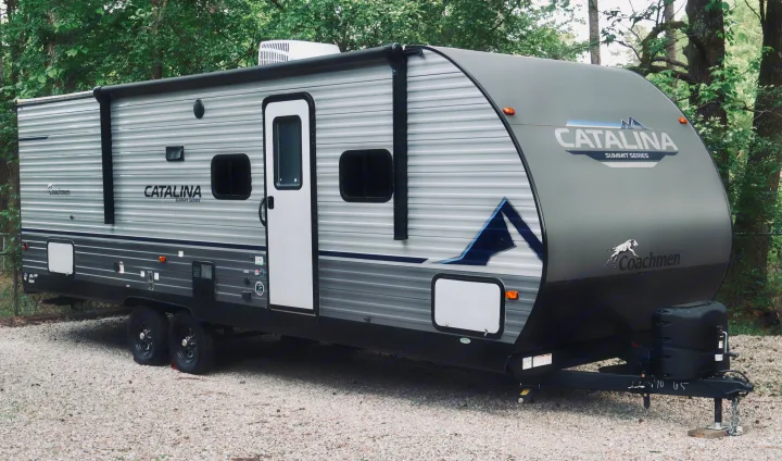 Modern grey Coachmen Catalina travel trailer, ideal for your next rv rental. This recreational vehicle is ready for camping adventures.. Coachmen Other 2023