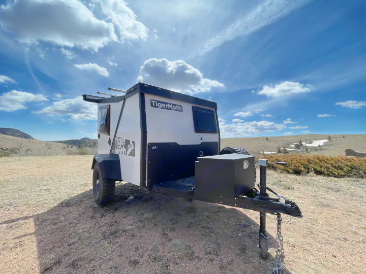 This overland TigerMoth camper trailer is perfect for your next rv rental adventure, parked amidst nature.. TAXA Outdoors Tigermoth Camper 2021