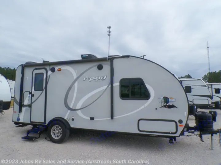 Gray R-Pod travel trailer, a compact RV. Consider it for your next RV rental adventure!. Forest River R-Pod 2020