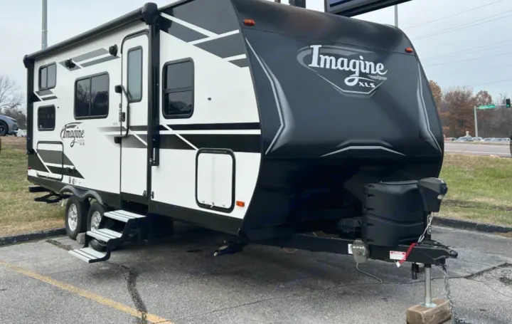 This Grand Design Imagine XLS travel trailer is a sleek black and white option for your next rv rental adventure.. Grand Design Imagine XLS 2021