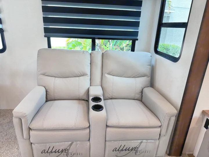 Comfortable light grey RV recliners with cup holders provide ideal seating for your next RV rental adventure.. Crusader Crusader Fifth Wheel 2022