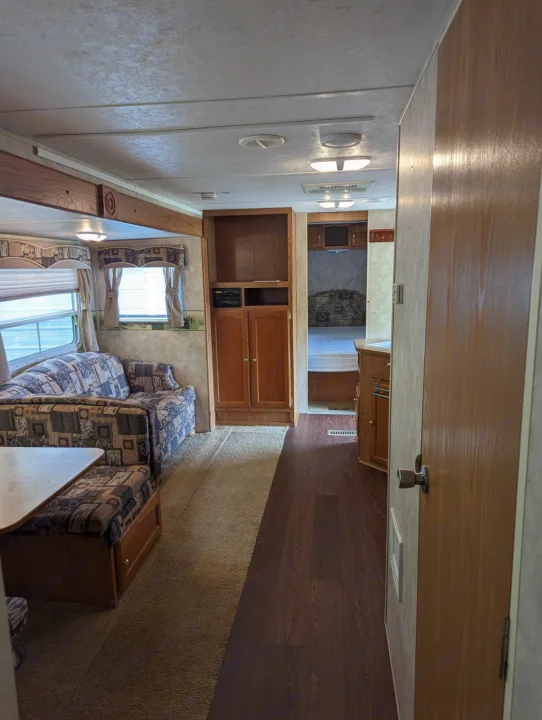 Living and dining areas, along with pantry. Keystone RV Springdale 2006