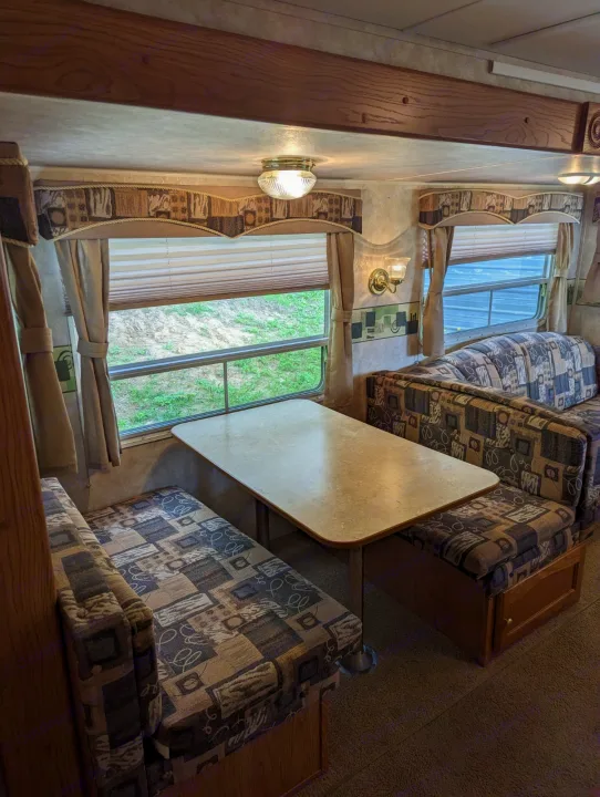 Dinette folds down into sleeping area. Keystone RV Springdale 2006