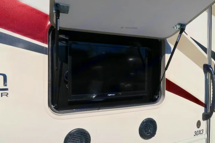 This rv rental features an exterior compartment with a mounted Furrion TV and speakers for outdoor entertainment.. Forest River Georgetown 2018