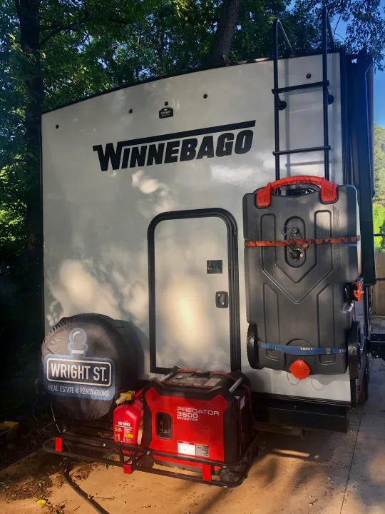 This Winnebago RV with rear accessories: generator, portable water tank & custom spare tire cover. Ready for your rv rental!. Winnebago Minnie 2022