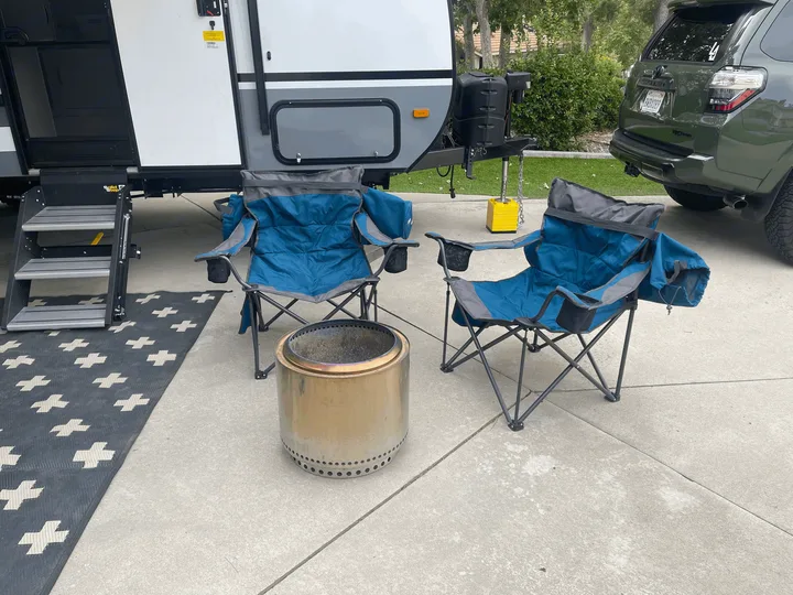 Camping chairs and solo stove (stove is optional add on). Coachmen Apex Nano 2021