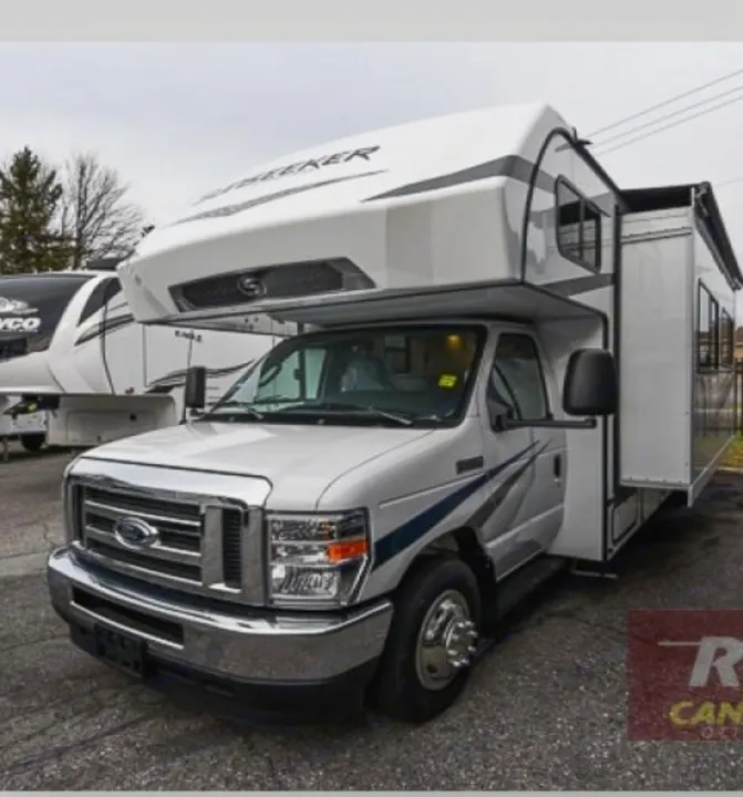 This white Ford Class C RV is ready for your next adventure. Explore travel freedom with this spacious motorhome, ideal for rv rental.. Forest River Sunseeker LE 2023