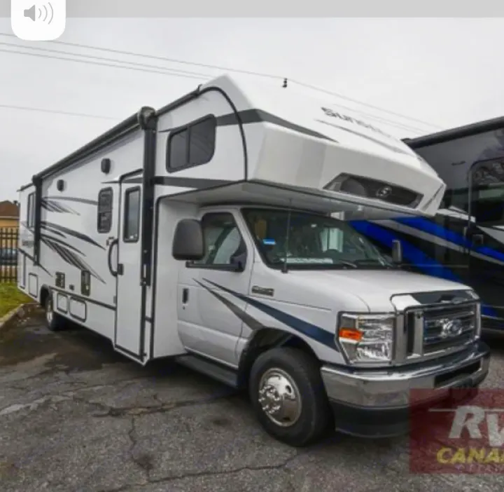 White Ford Class C motorhome, an ideal RV rental for family road trips and comfortable travel.. Forest River Sunseeker LE 2023
