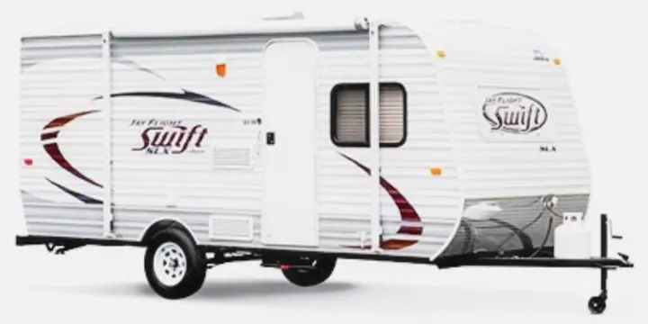Compact white Jay Flight Swift SLX travel trailer, perfect for your next rv rental adventure. This single-axle RV has an awning.. Jayco Jay Flight SLX 2015
