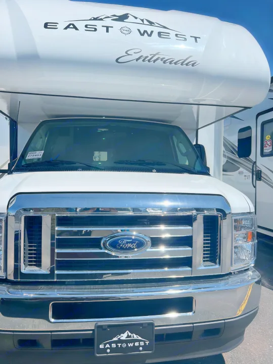 Front view of a white East West Entrada motorhome, a spacious RV rental ready for your next road trip adventure.. EAST TO WEST ENTRADA  2600DS 2023