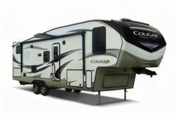 This white Cougar fifth-wheel RV, a large recreational vehicle, is ideal for an RV rental. Perfect for travel adventures!. Keystone RV Cougar 2022