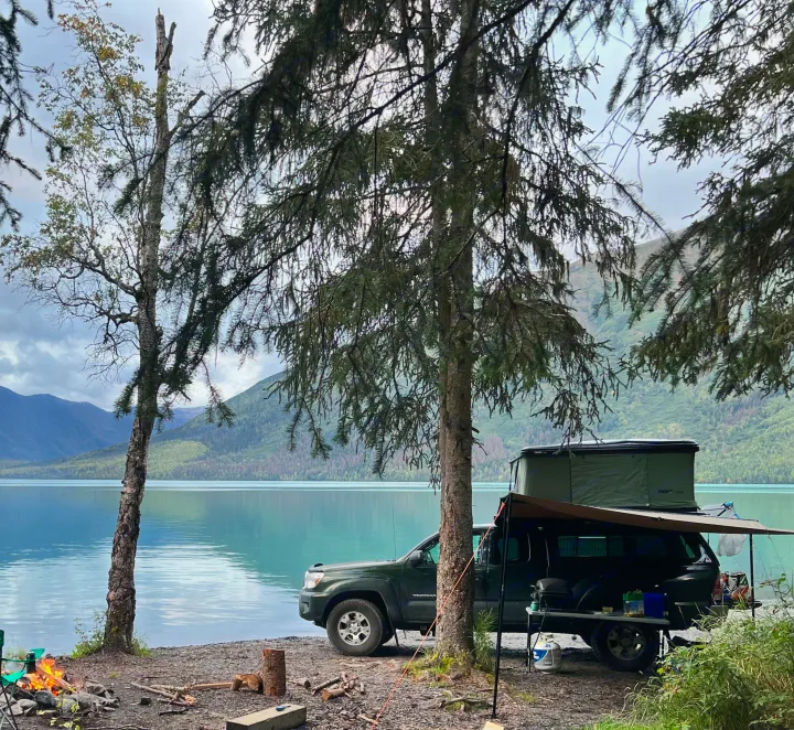 Lakeside camping with a truck, rooftop tent & awning. Ideal for outdoors, a unique RV rental alternative for adventure!. Toyota Tacoma 2012