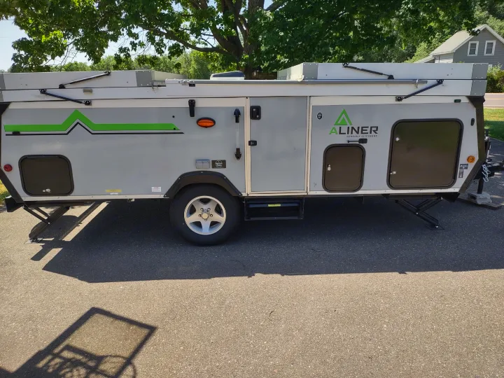 Gray A-liner pop-up camper, a compact RV. Ideal for rv rental and travel adventures.. A Liner A Liner Popup Trailer 2022