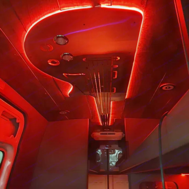 Explore this RV rental's unique custom interior, showcasing a bold red LED guitar design on the ceiling and ambient lighting.. Mercedes Sprinter Freight Liner 2020