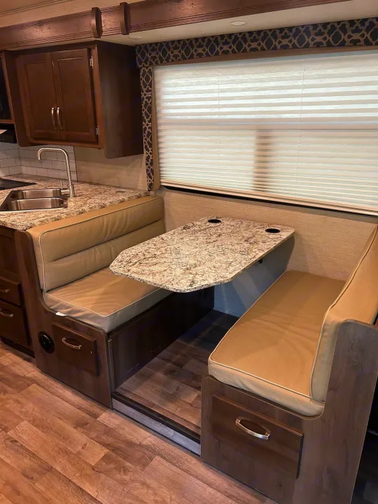 Explore comfort in your next rv rental! This modern RV features a functional kitchenette & cozy dinette with storage.. Jayco Redhawk 2020