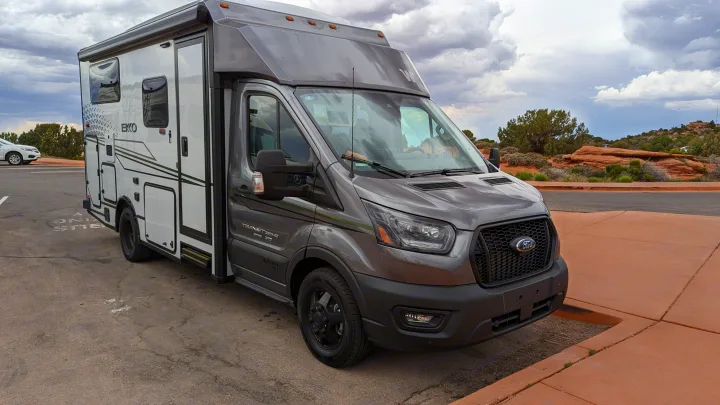 This sleek grey Winnebago Ekko RV motorhome on a Ford Transit chassis is shown, a perfect rv rental for scenic travel.. Winnebago Ekko 2023