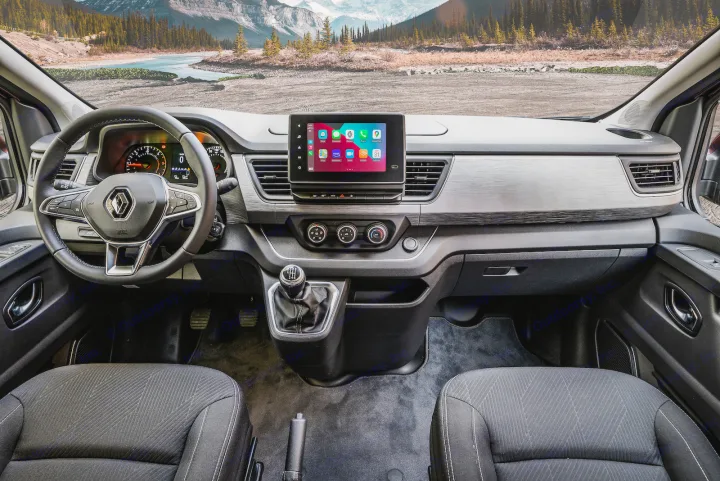 Inside a modern RV rental van: steering wheel, large infotainment screen with apps, manual gear, and scenic mountain view.. HANROAD TREK 4 2023