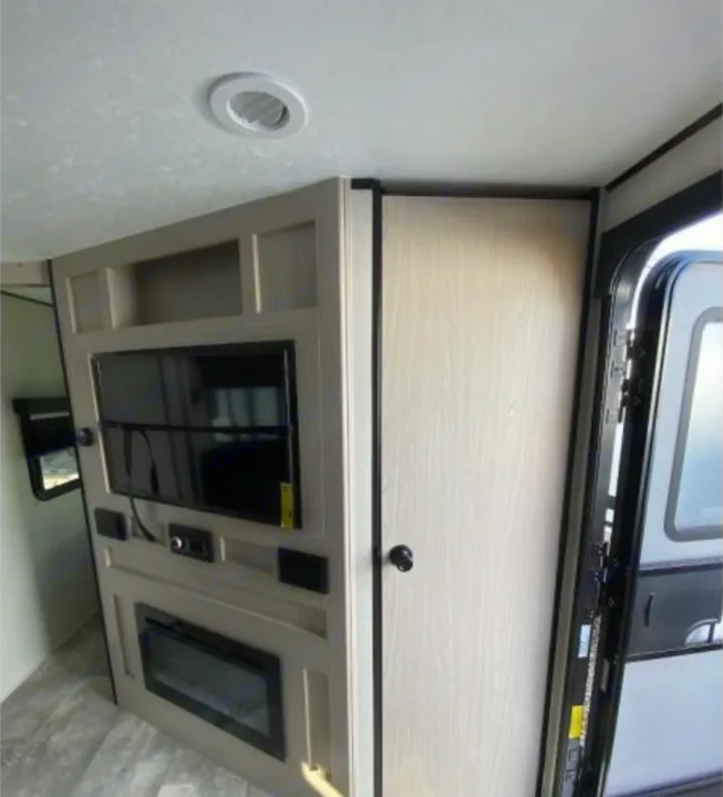 Step inside this RV rental: an entertainment wall with TV, stereo, and fireplace, plus an interior door. Your cozy journey awaits!. Coachmen Other 2022