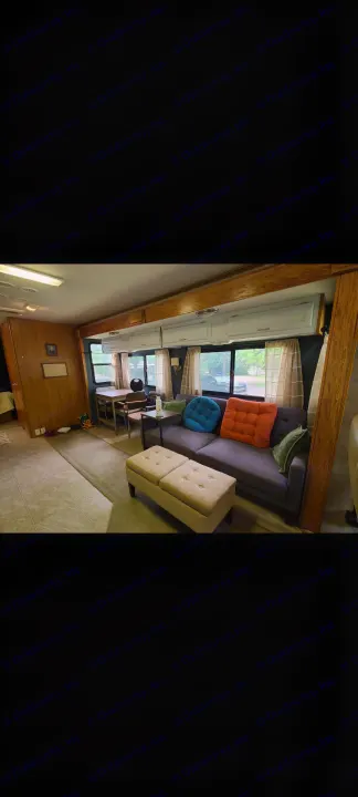 Comfortable RV rental living area with sofa, dining space, and cozy decor, perfect for your next adventure.. Fleetwood Other 2006
