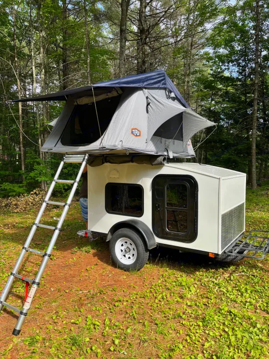 Compact RV rental: Teardrop trailer with a rooftop tent in a serene forest. Perfect for outdoor adventures and camping trips!. Other Other 2020