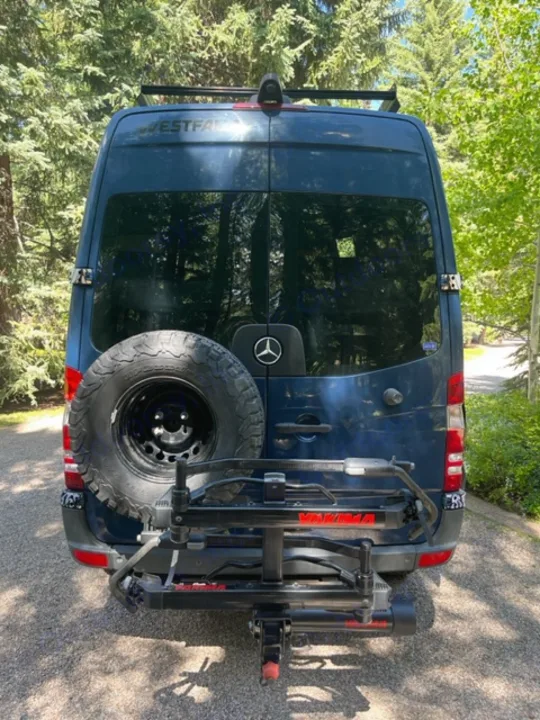 Westfalia Mercedes-Benz Sprinter RV rental van with a spare tire & Yakima bike rack. Perfect for outdoor adventures.. Mercedes Sprinter 2016
