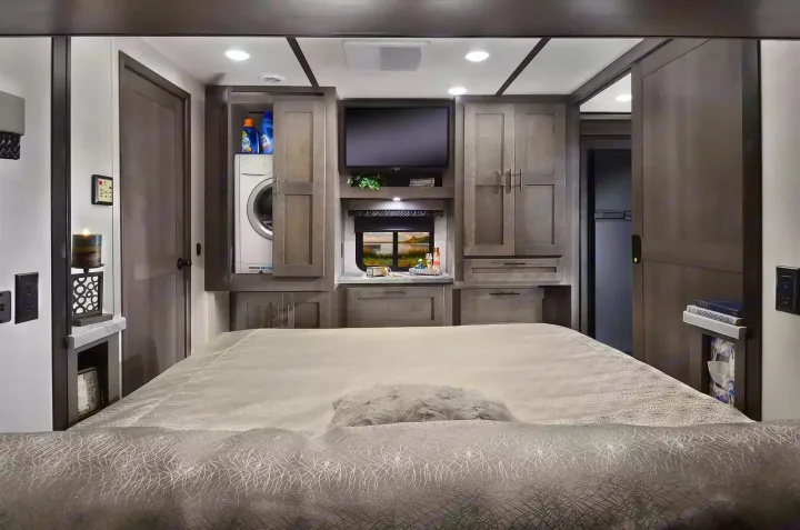  Luxe queen-size bed awaits in the main suite of the 2022 Forest River FR3 34DS. Sleep like royalty on your RV adventures. 👑🛏️. Forest River FR3 2022