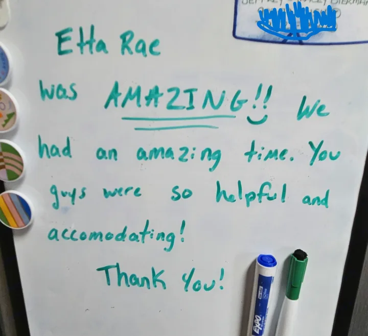 Whiteboard with a glowing RV rental review: "Etta Rae was AMAZING!! ...so helpful and accomodating! Thank You!". Dutchmen Aerolite 2017