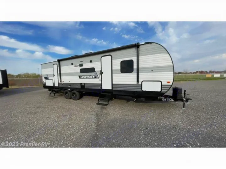 Spacious gray & white Sportsmen travel trailer, perfect for RV rental adventures. Ready for your next journey!. KZ Sportsmen SE 2021