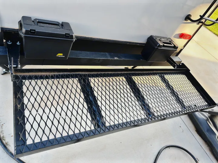 Enhance your RV rental with this rear cargo rack and secure storage boxes, ideal for gear on any trip.. Forest River Surveyor Legend 2022