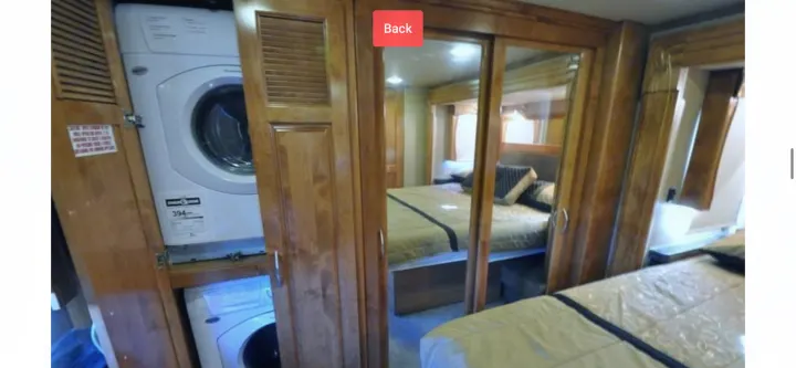 RV rental with a convenient stacked washer/dryer and a spacious bedroom featuring mirrored closet doors. Perfect for extended trips!. Monaco Vesta 2012