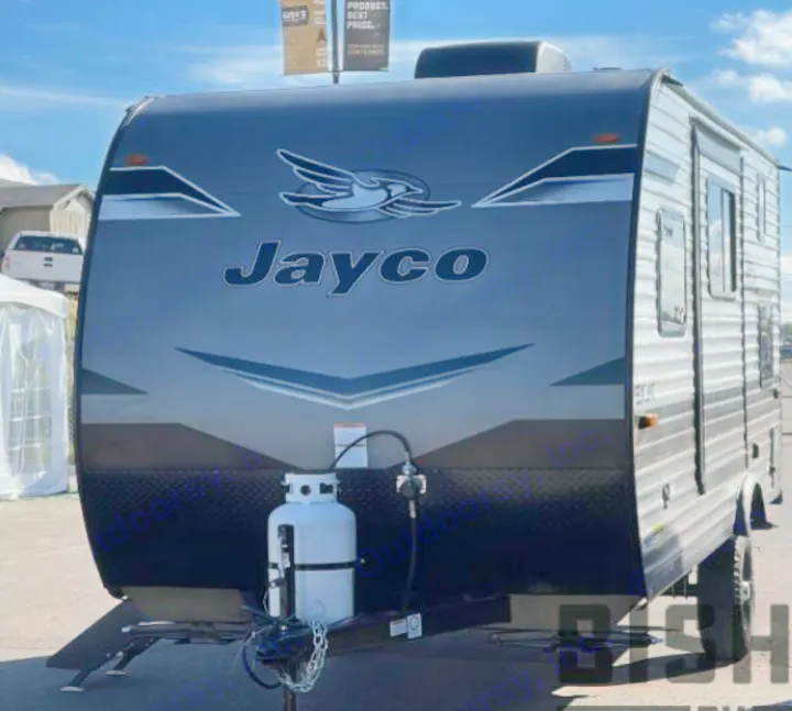 This gray Jayco travel trailer, featuring a front propane tank, is ready for your next rv rental adventure.. Jayco Jay Flight SLX 2023