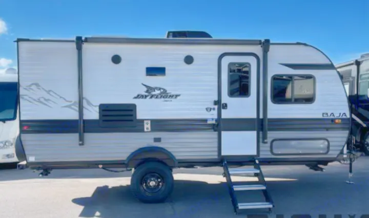 This Jay Flight Baja travel trailer is a great option for your next RV rental adventure, featuring an awning and steps.. Jayco Jay Flight SLX 2023