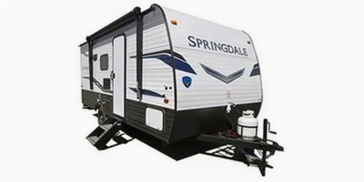 This white and black Springdale travel trailer is an excellent rv rental option, featuring an awning, entry steps, and propane tanks.. Keystone RV Springdale 2022